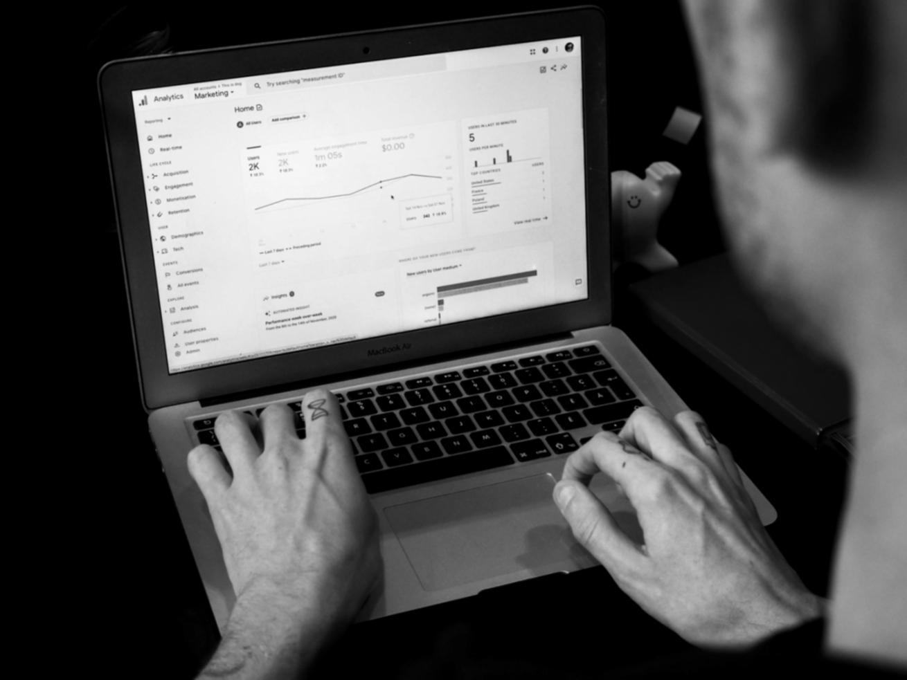 Investment analysis workspace showing charts and financial data being reviewed
